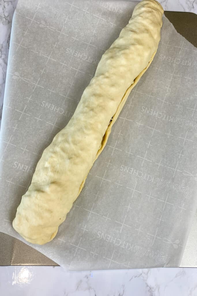rolled pizza dough to log
