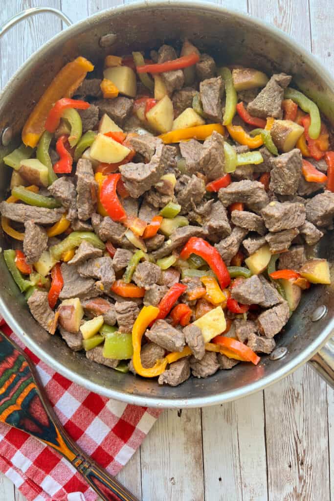 spanish steak with peppers and onions