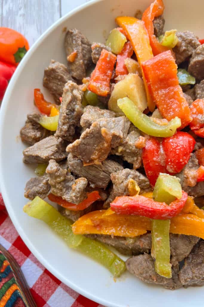 steak with bell peppers and onions